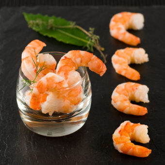 FROZEN Cooked and peeled tropical prawns FRESHPACK