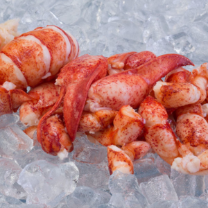 Whole pieces of frozen lobster tail, claws and legs